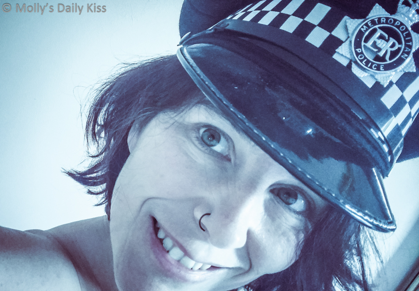 Molly wearing Police Hat for Kink of the week topic of Uniforms
