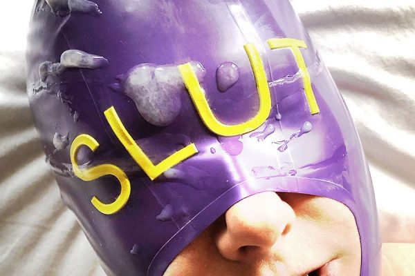 Person wearing purple hood with the word slut written where the eyes should be for post about hoods